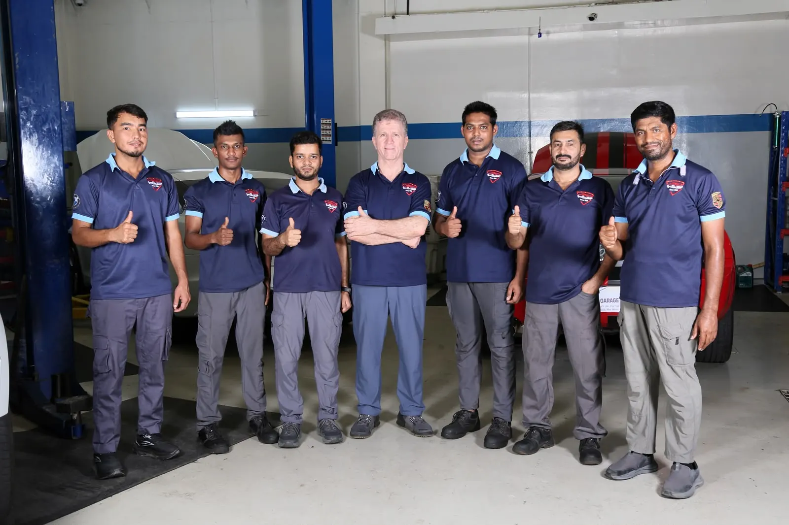 Automotive electrical technician at work inside Missak Auto Garage